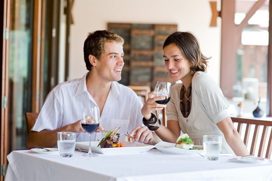 Couple dining by a window
